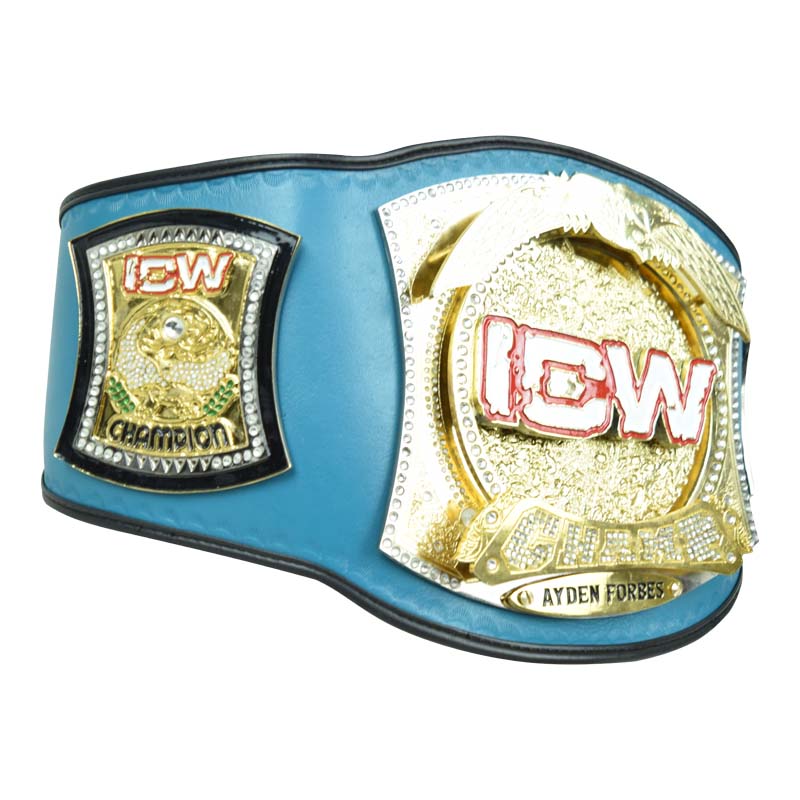 Angled close-up of a gold custom spinner belt main plate with eagle design and custom engraving.